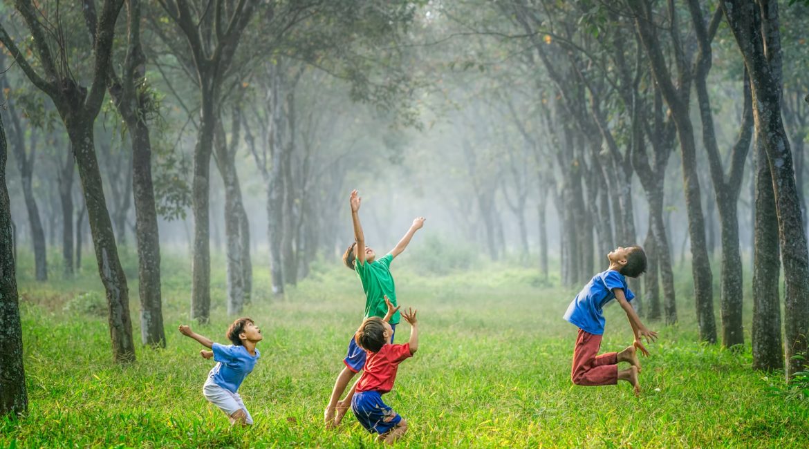 Kids playing in the forest