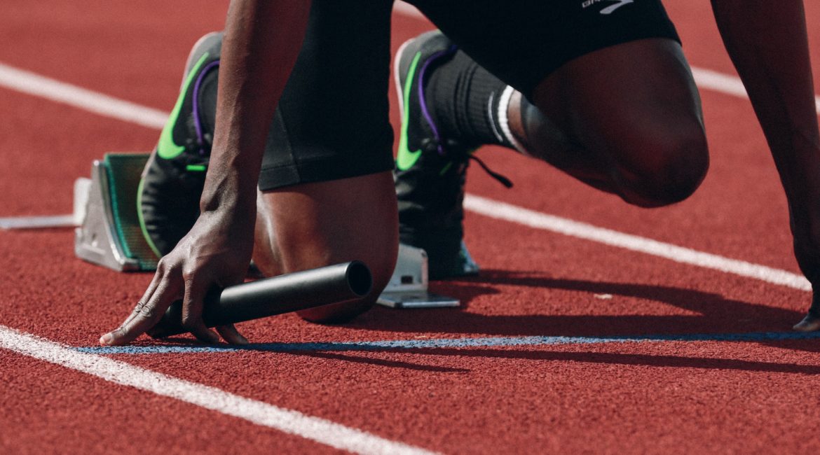 person at track ready to race